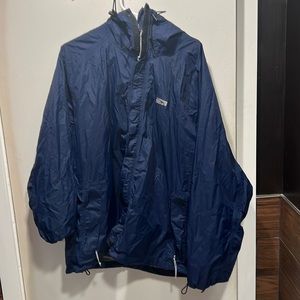 Red Ledge windbreaker and rain jacket for outdoor wear